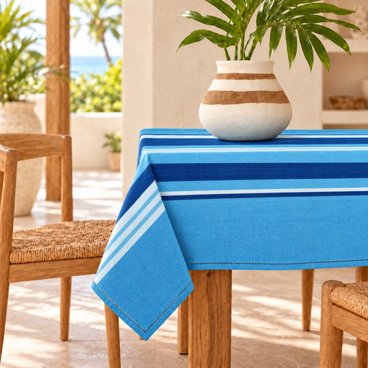 Athenia turquoise striped tablecloth in a coastal dining room