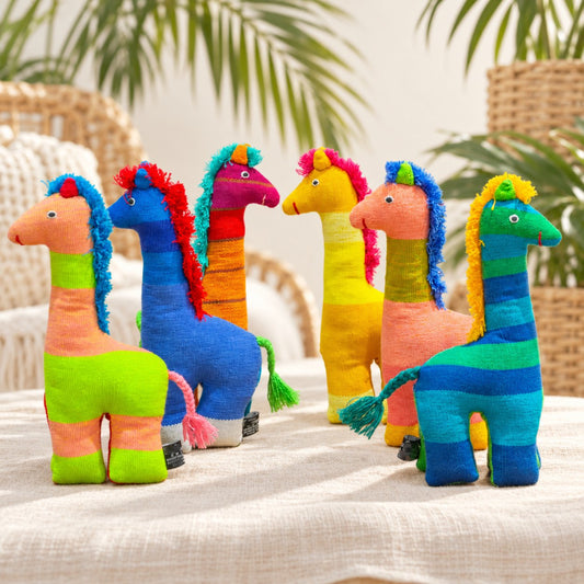 Giraffes — product view in a tropical coastal setting