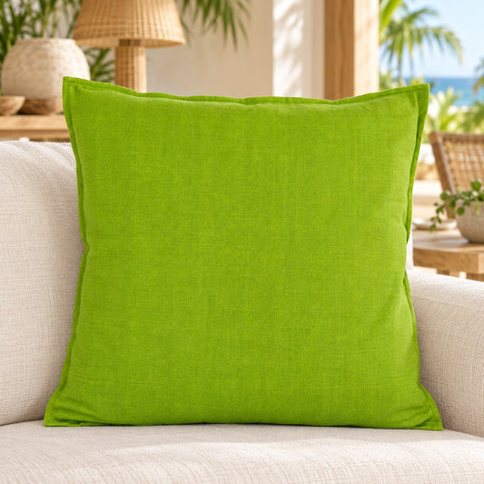 Olive cushion cover in a tropical coastal setting