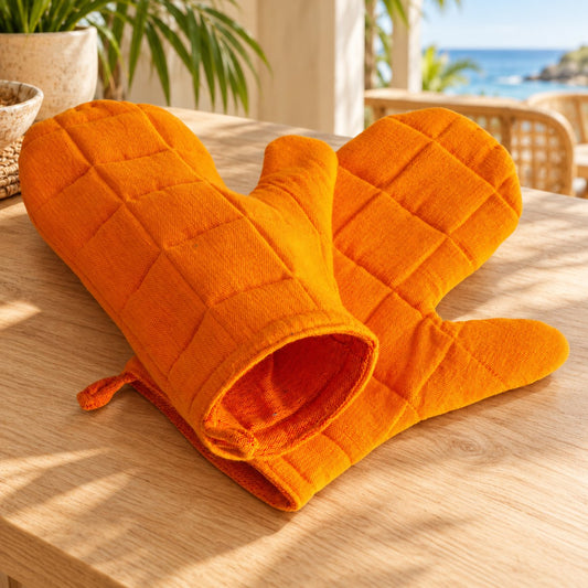 Oven Gloves — Orange Pop in a tropical coastal setting